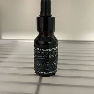 Sleek Black Hair Repair Treatment by